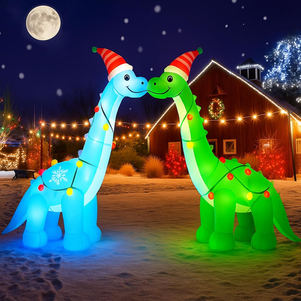 Two inflatable dinosaurs in Santa hats kissing to form an arch at night