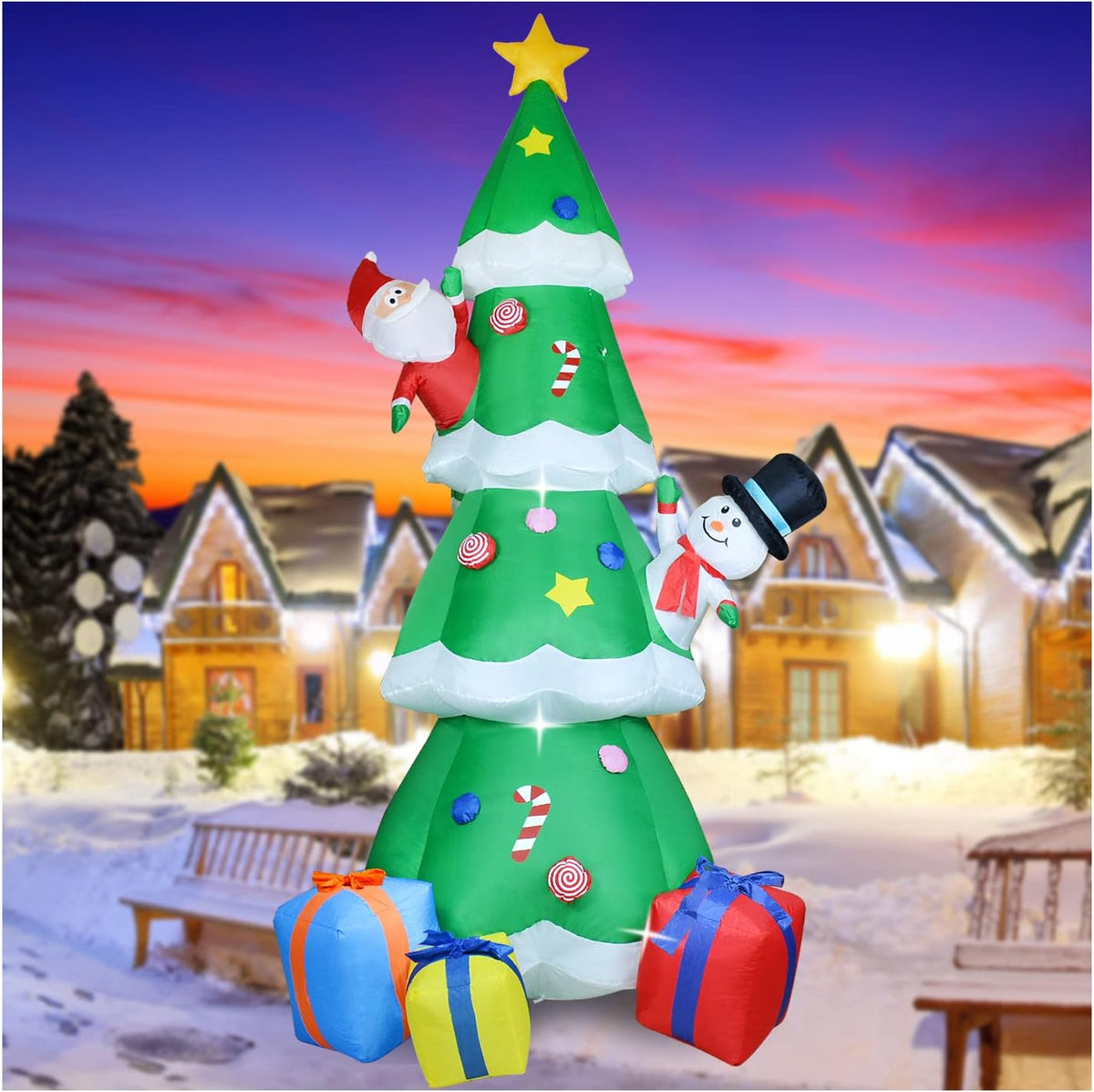 Inflatable green Christmas tree with ornaments and gifts at dusk