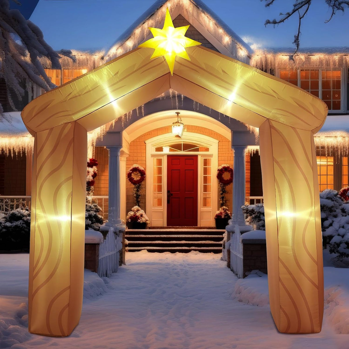 Inflatable wooden-style nativity stable arch with a star over a front path