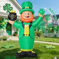 Inflatable leprechaun in a green suit holding a pot of gold