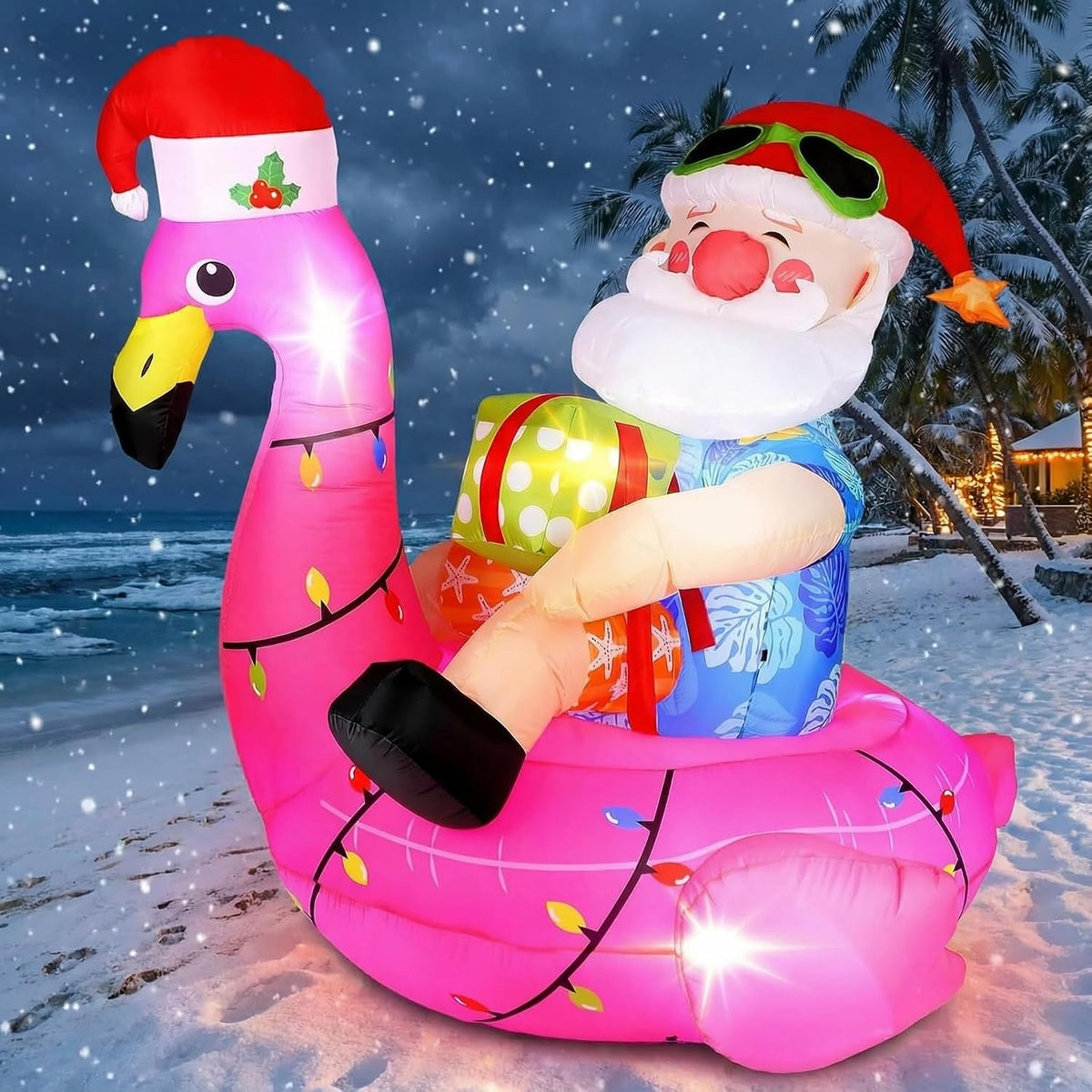 Inflatable Santa in sunglasses riding a pink flamingo float