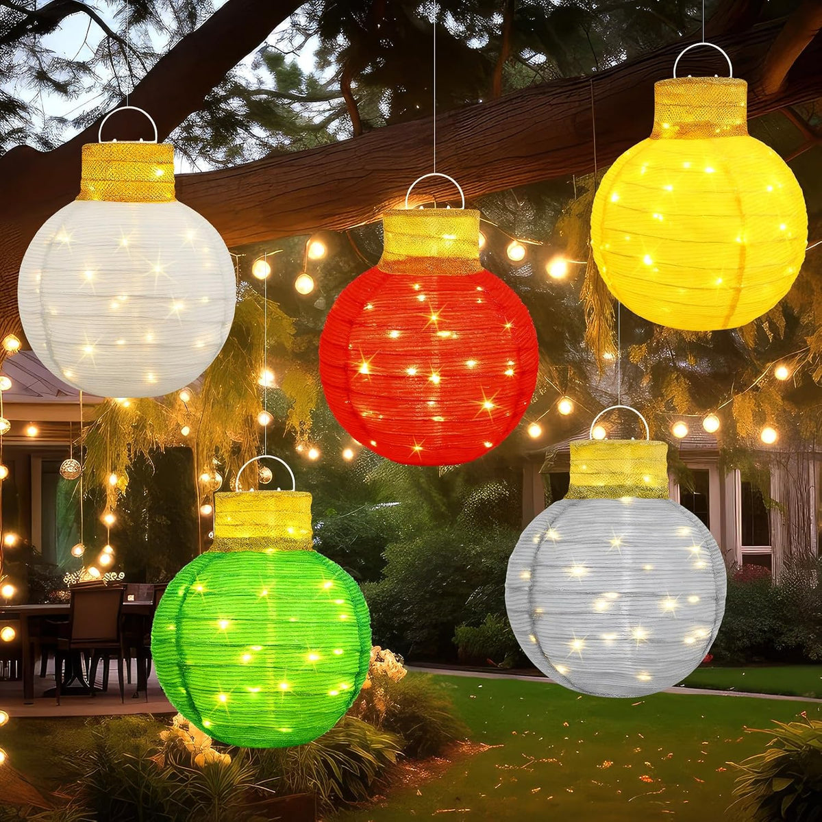 Five glowing pop-up ornament balls hanging from trees