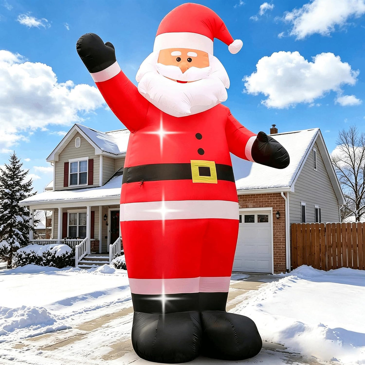 Giant inflatable Santa waving in front of a house on a sunny day
