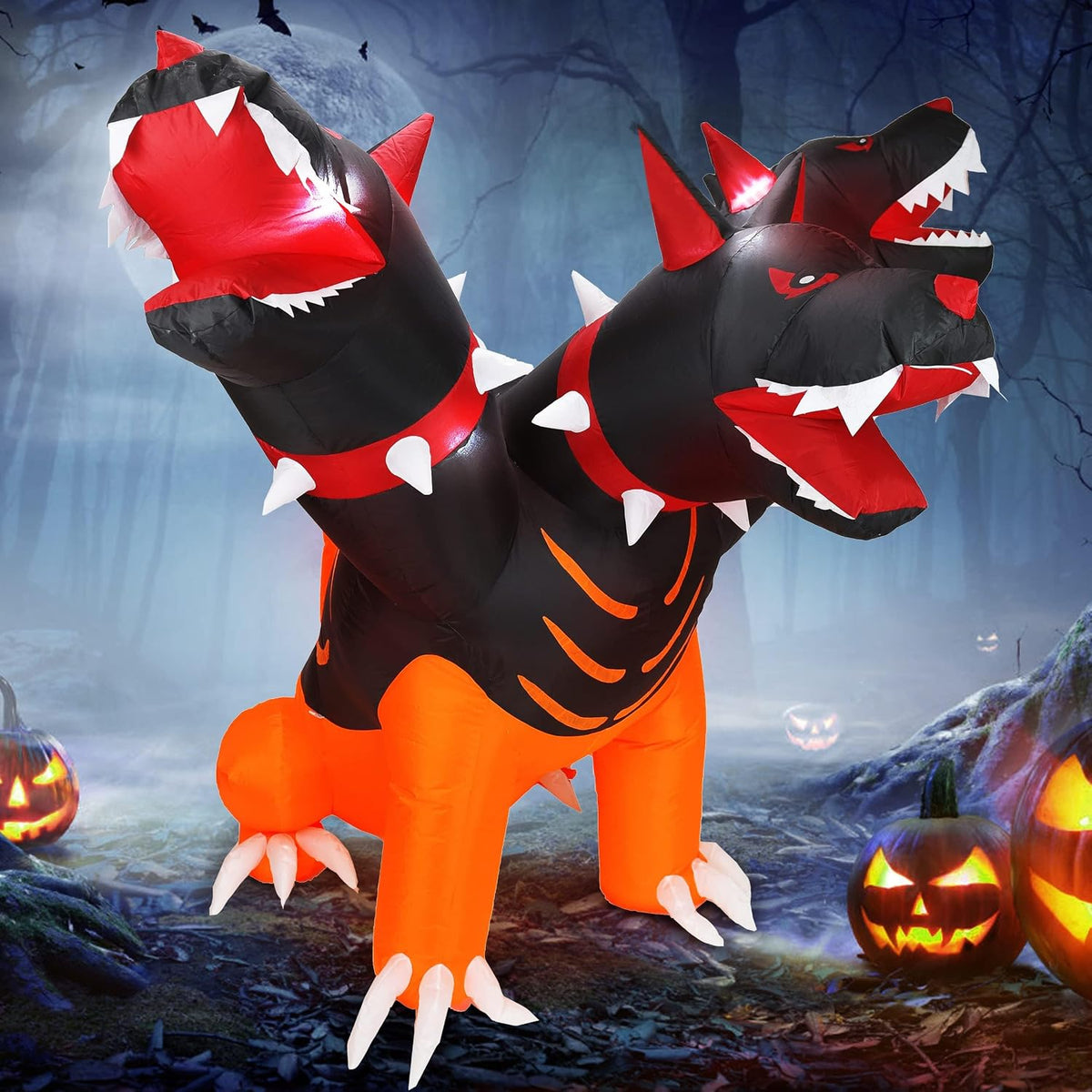 Inflatable three-headed red and black guard dog on a Halloween lawn